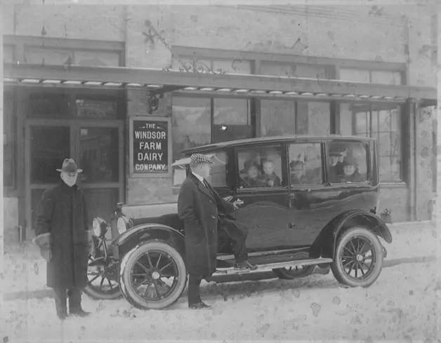 Antique car in front of the Windsor Farm Dairy Company, what is now the Dairy Block in downtown Denver