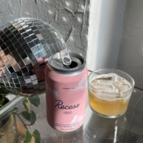 Recess water, disco ball, beverage in glass with ice
