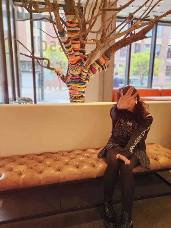 woman hiding her face at dairy block denver