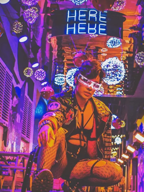 person posing in the alley at dairy block denver