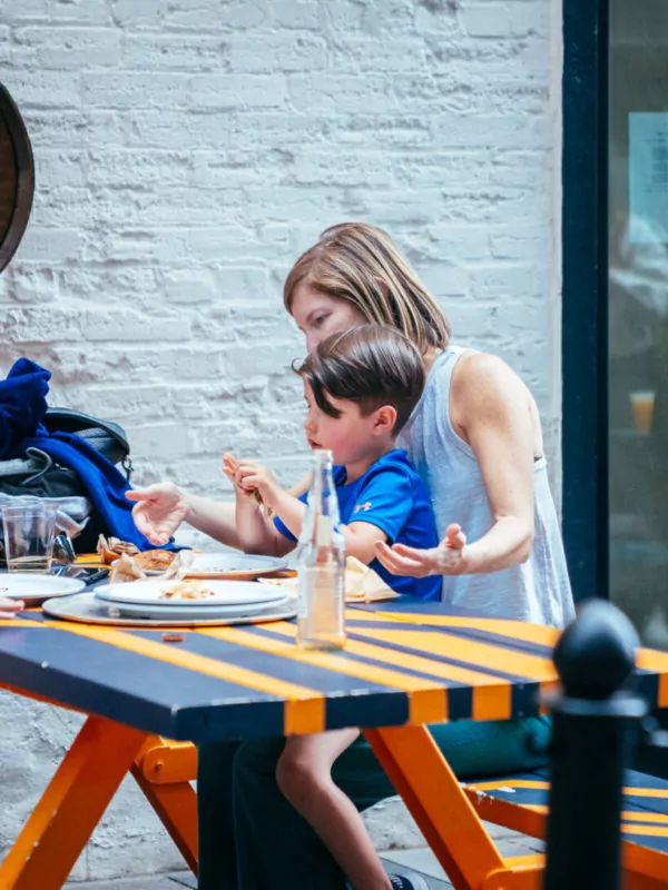 mom and child eating at dairy block denver